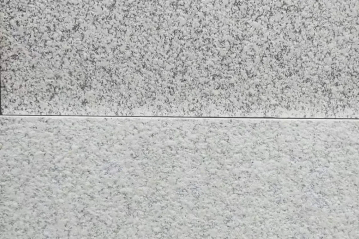 Fired stone-pattern face of a foamed ceramic panel