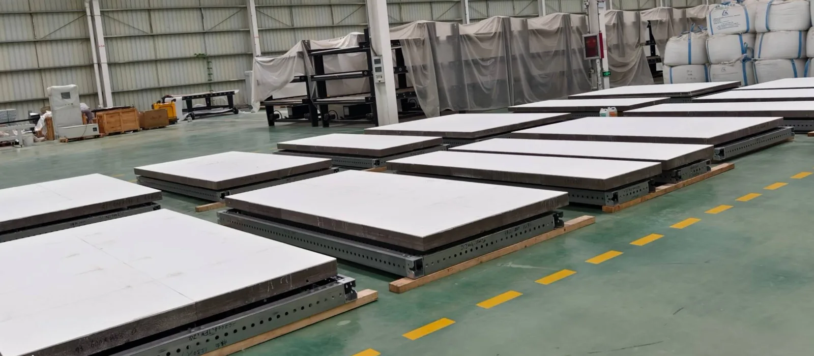 Finished foamed ceramic composite panels on a production floor